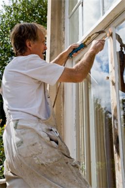 Exterior decorating of sash windows in London
