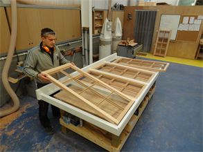 Click to enlarge - One of our craftsmen hard at work making a new replica double glazed Georgian casement frame